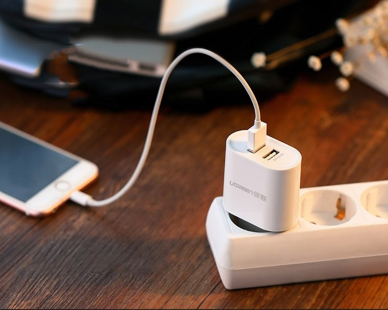 Įkroviklis Ugreen CD104 2xUSB-A 2.4A baltas