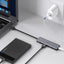 USB šakotuvas Ugreen CM219 USB-A to 4xUSB-A (MicroUSB Power Supply) pilkas