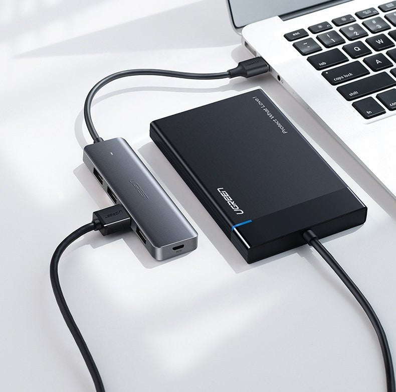 USB šakotuvas Ugreen CM219 USB-C to 4xUSB-A (USB-C Power Supply) pilkas